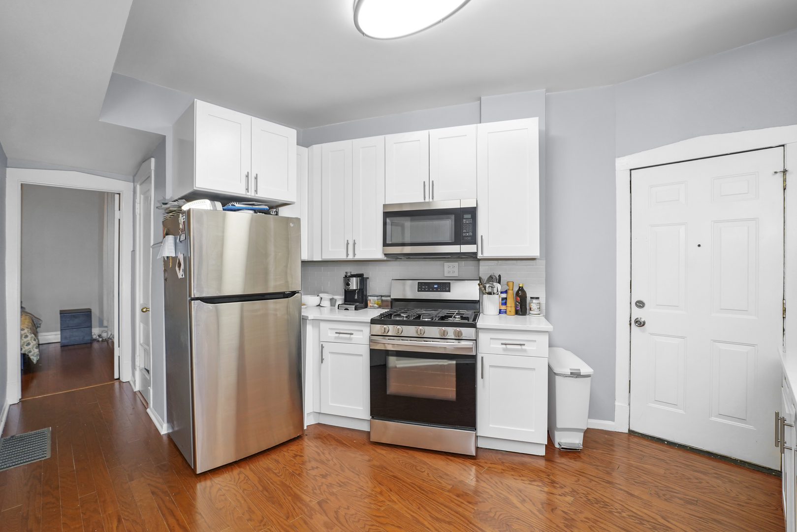 4363 North Lincoln Avenue Chicago, IL 60618 - Photo 31 of 34 a kitchen with a refrigerator sink and stove