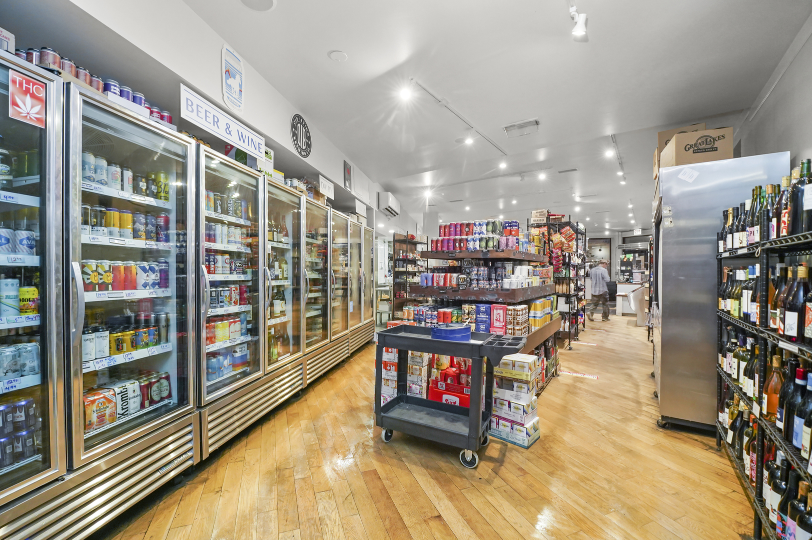 4363 North Lincoln Avenue Chicago, IL 60618 - Photo 5 of 34 a room with lots of furniture and book shelf