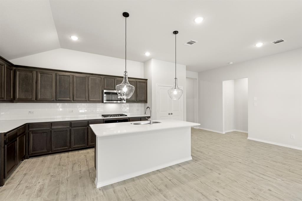 114 Bandit Trail Terrell, TX 75160 - Photo 5 of 27 09. 114 Bandit - Kitchen (3)