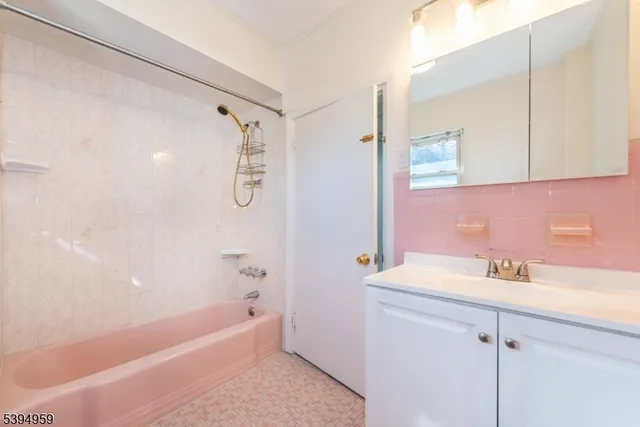 a bathroom with a sink and a bathtub