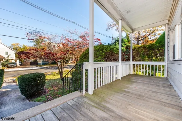 a view of a porch and garden