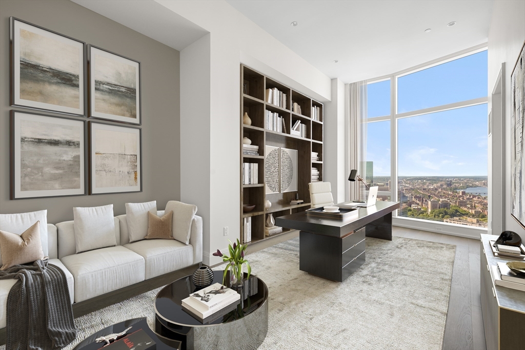 240 Devonshire Street, Unit 4901 Boston, MA 02110 - Photo 11 of 41 a living room with furniture and a large window