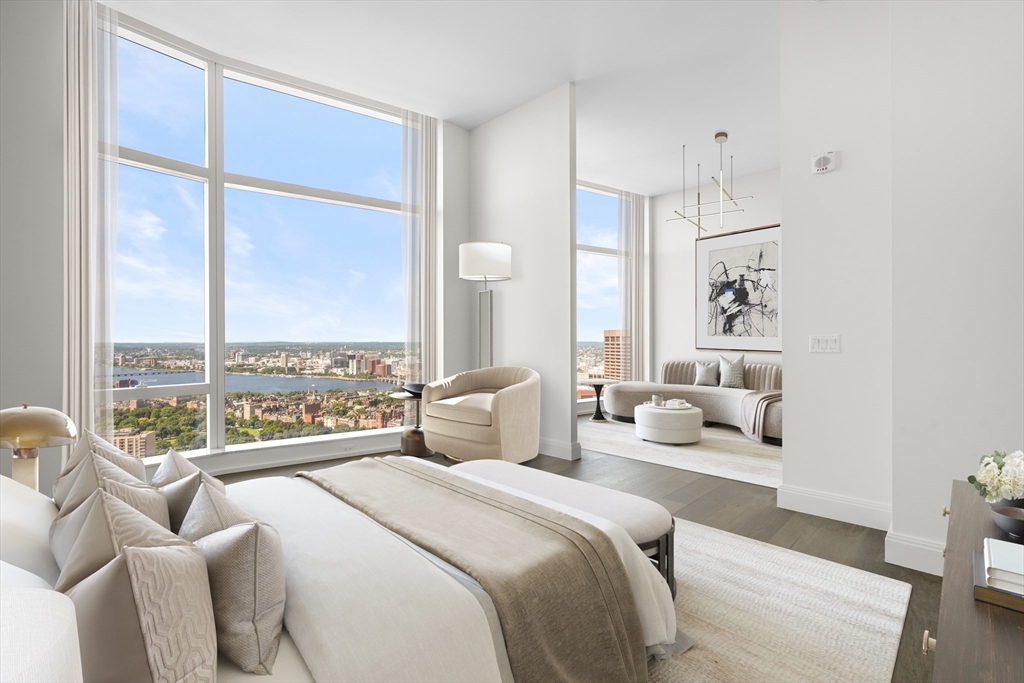 240 Devonshire Street, Unit 4901 Boston, MA 02110 - Photo 12 of 41 a bedroom with furniture and a large window