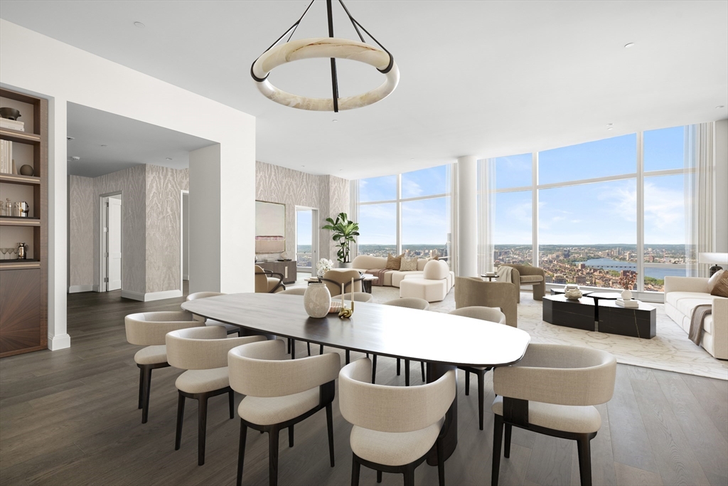 240 Devonshire Street, Unit 4901 Boston, MA 02110 - Photo 3 of 41 a view of a dining room with furniture window and wooden floor