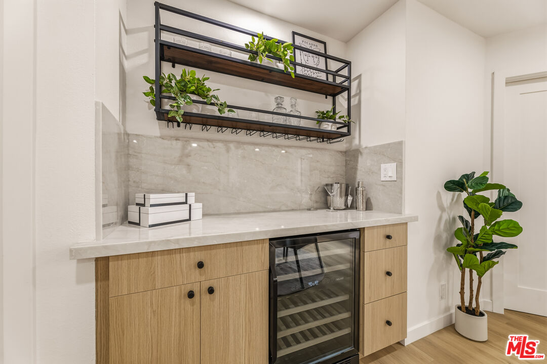 311 Bora Bora Way, Unit 3207 Marina del Rey, CA 90292 - Photo 12 of 54 a bathroom with a sink a faucet and a potted plant
