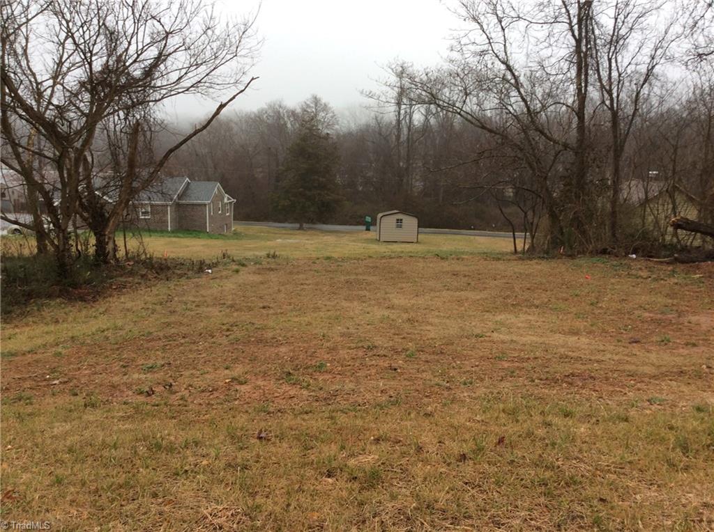 7739 Pine Street Rural Hall, NC 27045 - Photo 17 of 33 Backyard where you have enough room for a vegetable or flower garden and plenty of sunshine to make those plant grow.