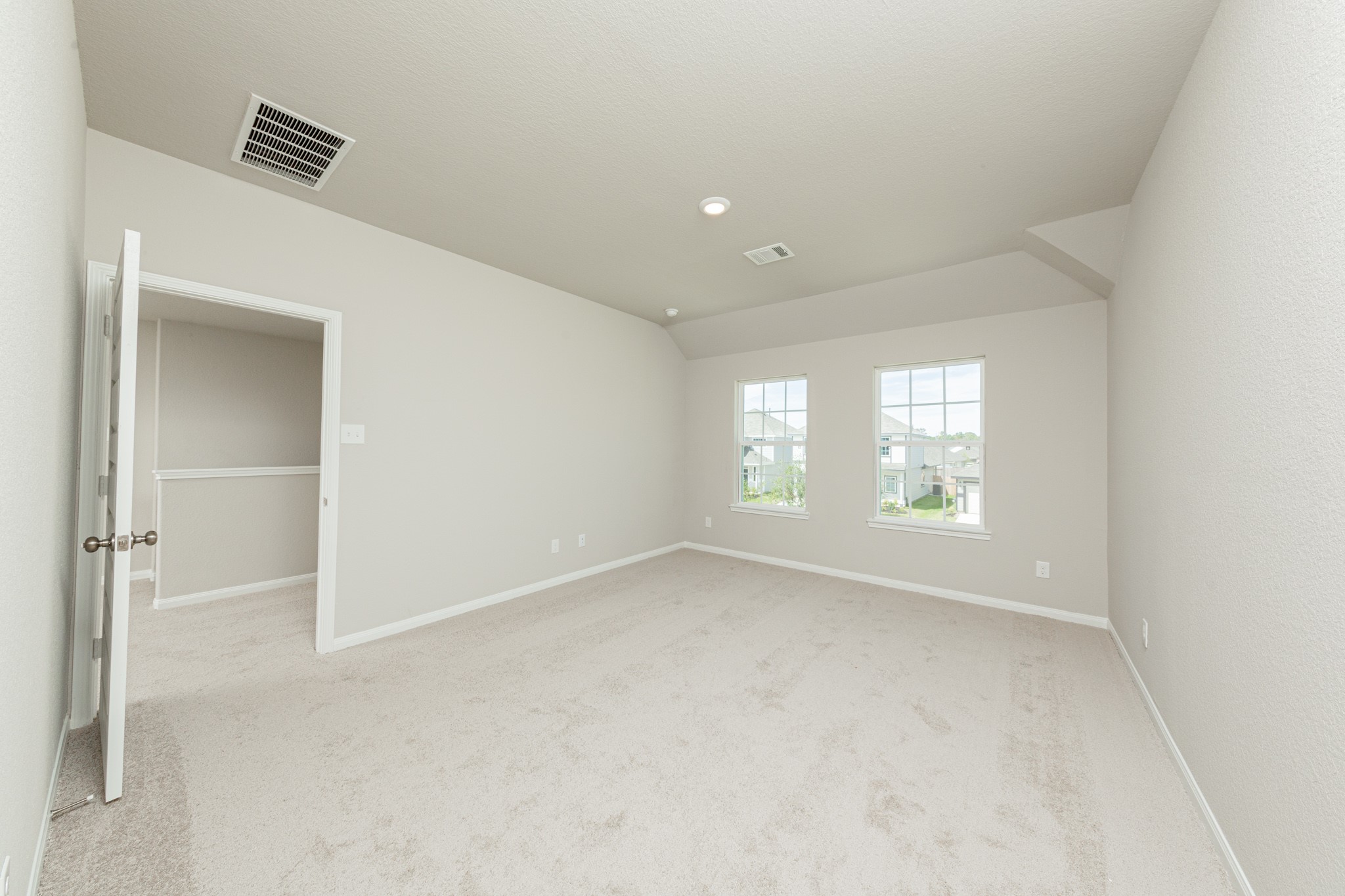 2540 Hawks Eye Drive Conroe, TX 77301 - Photo 10 of 18 an empty room with windows