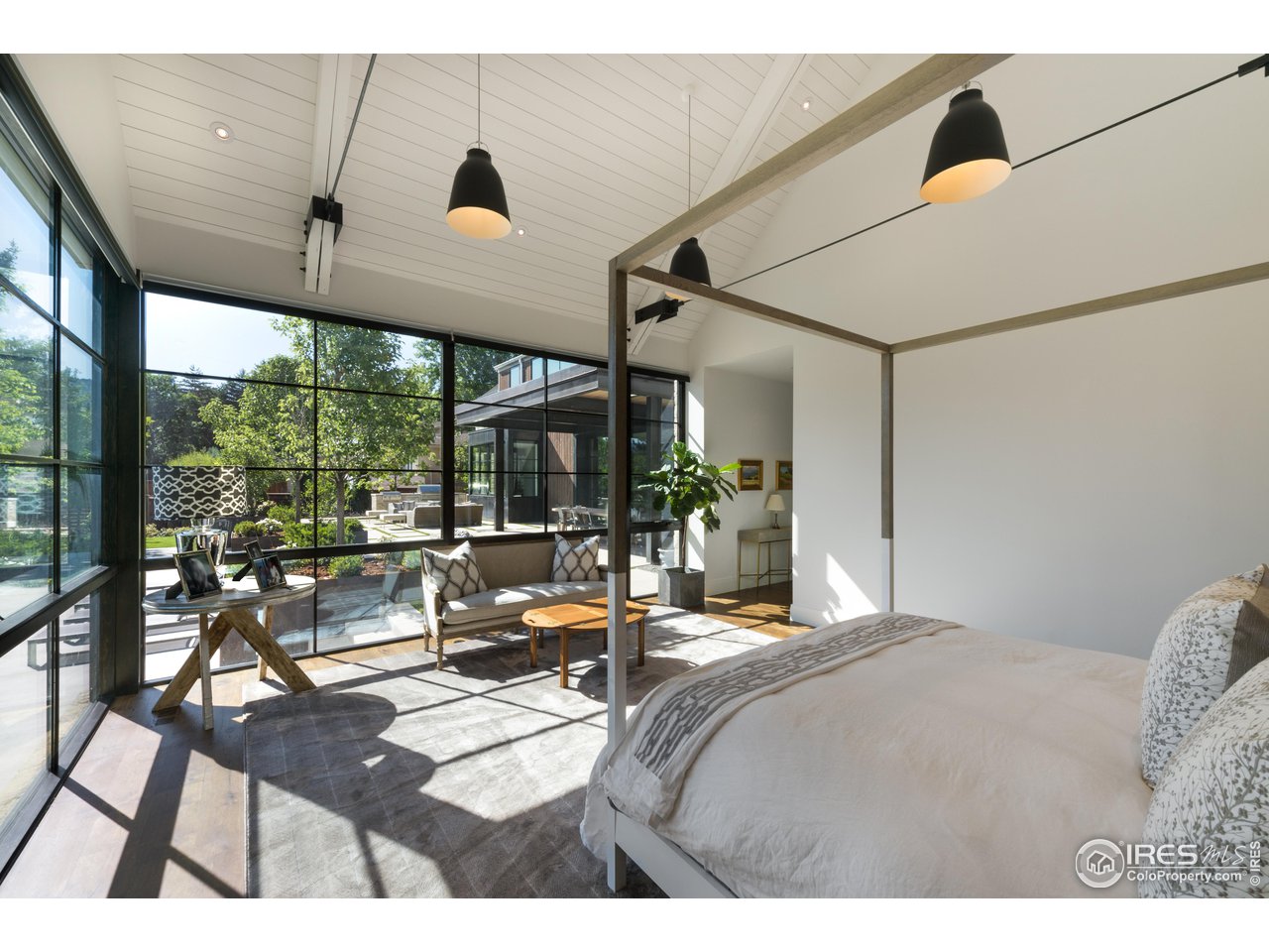 2260 Meadow Avenue Boulder, CO 80304 - Photo 14 of 21 a bedroom with furniture and large windows