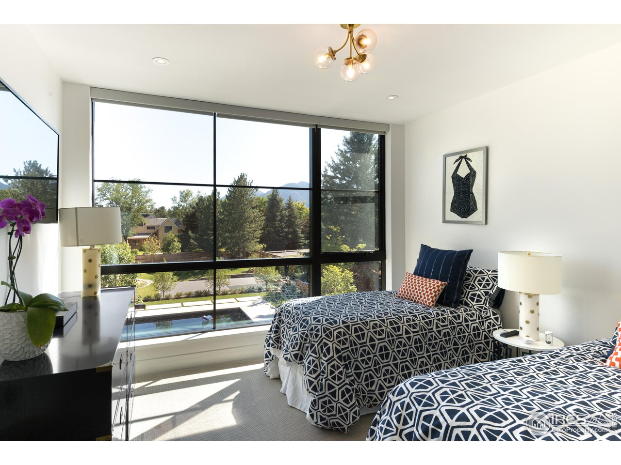 2260 Meadow Avenue Boulder, CO 80304 - Photo 17 of 21 a living room with a large window and a table