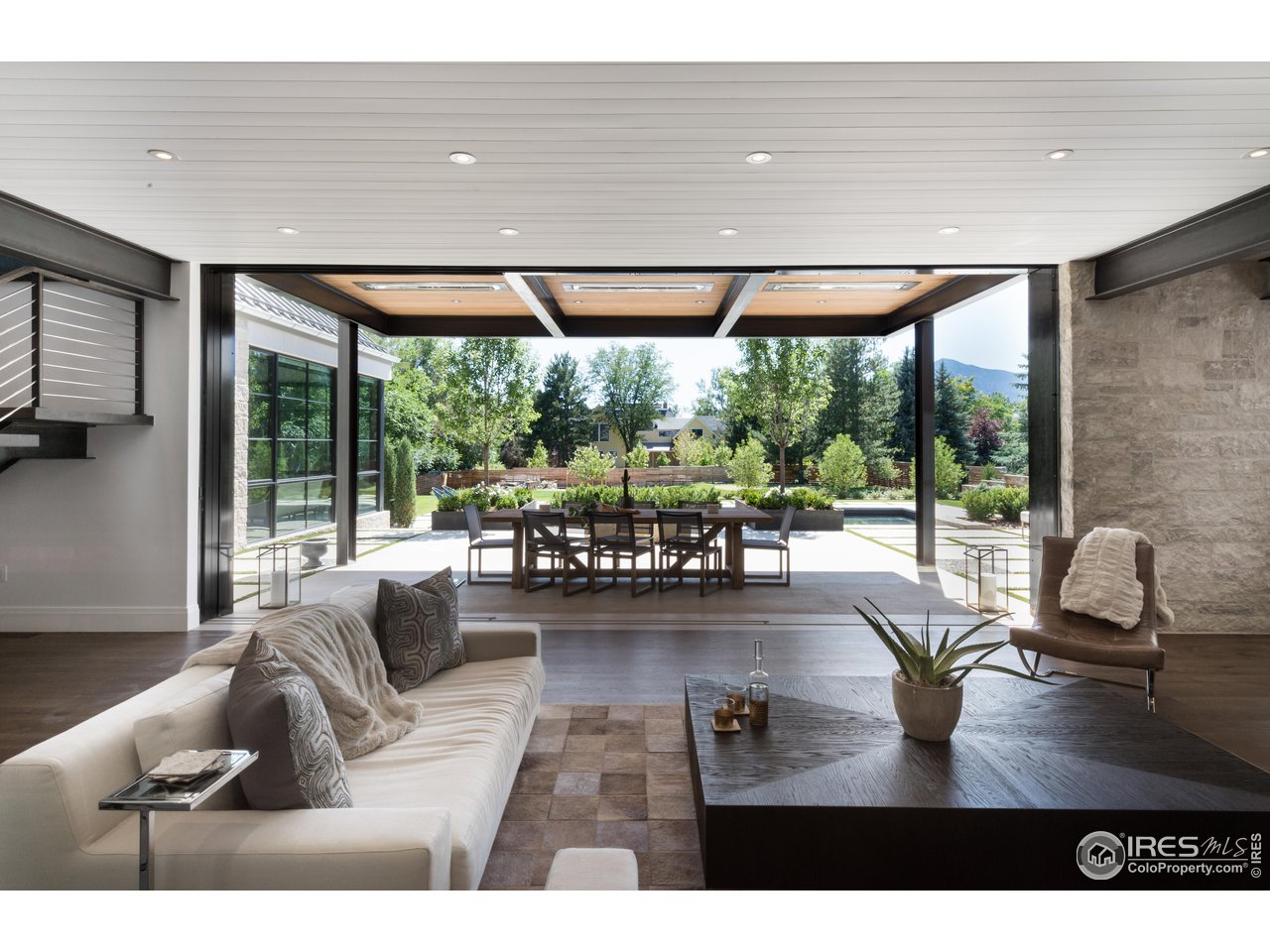 2260 Meadow Avenue Boulder, CO 80304 - Photo 6 of 21 a living room with furniture and a large window