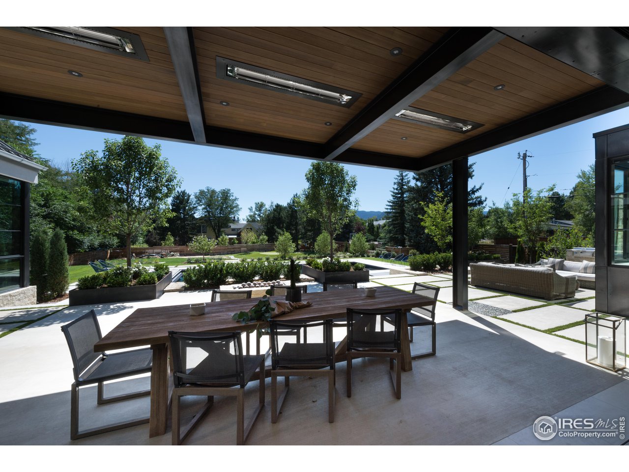 2260 Meadow Avenue Boulder, CO 80304 - Photo 7 of 21 a view of a patio with table and chairs and potted plants