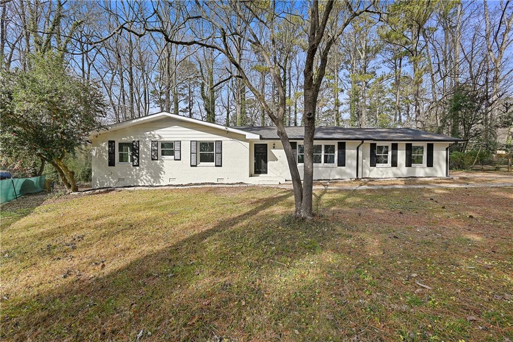 3383 Windsor Castle Court Decatur, GA 30034 - Photo 1 of 1 a front view of a house with a yard