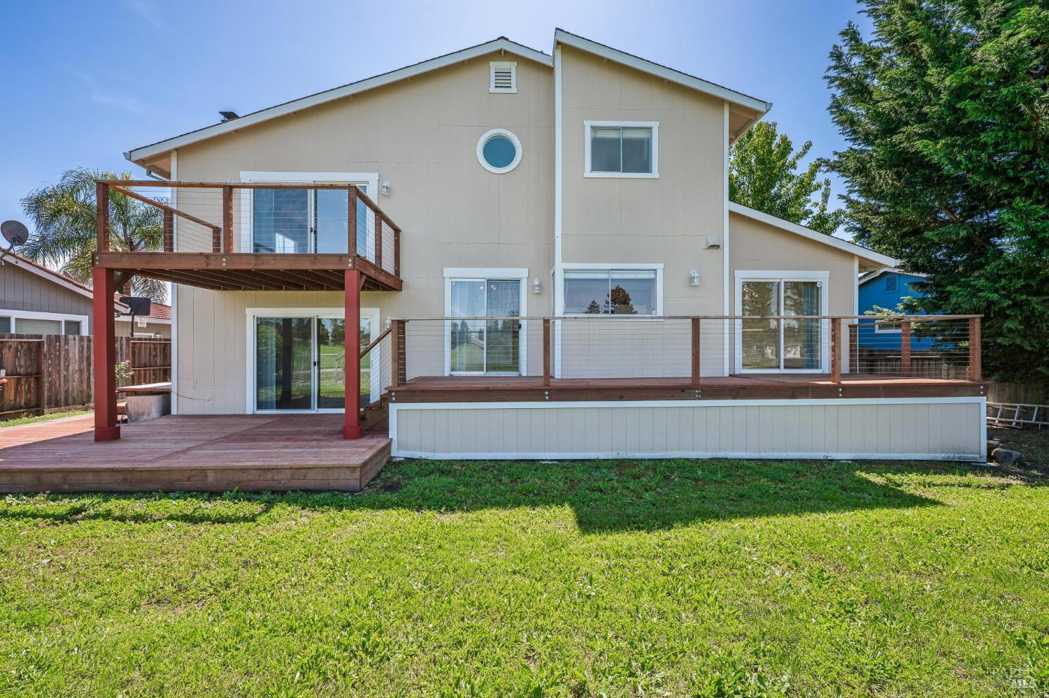 4987 Fern Place Rohnert Park, CA 94928 - Photo 49 of 54 a front view of a house with a yard