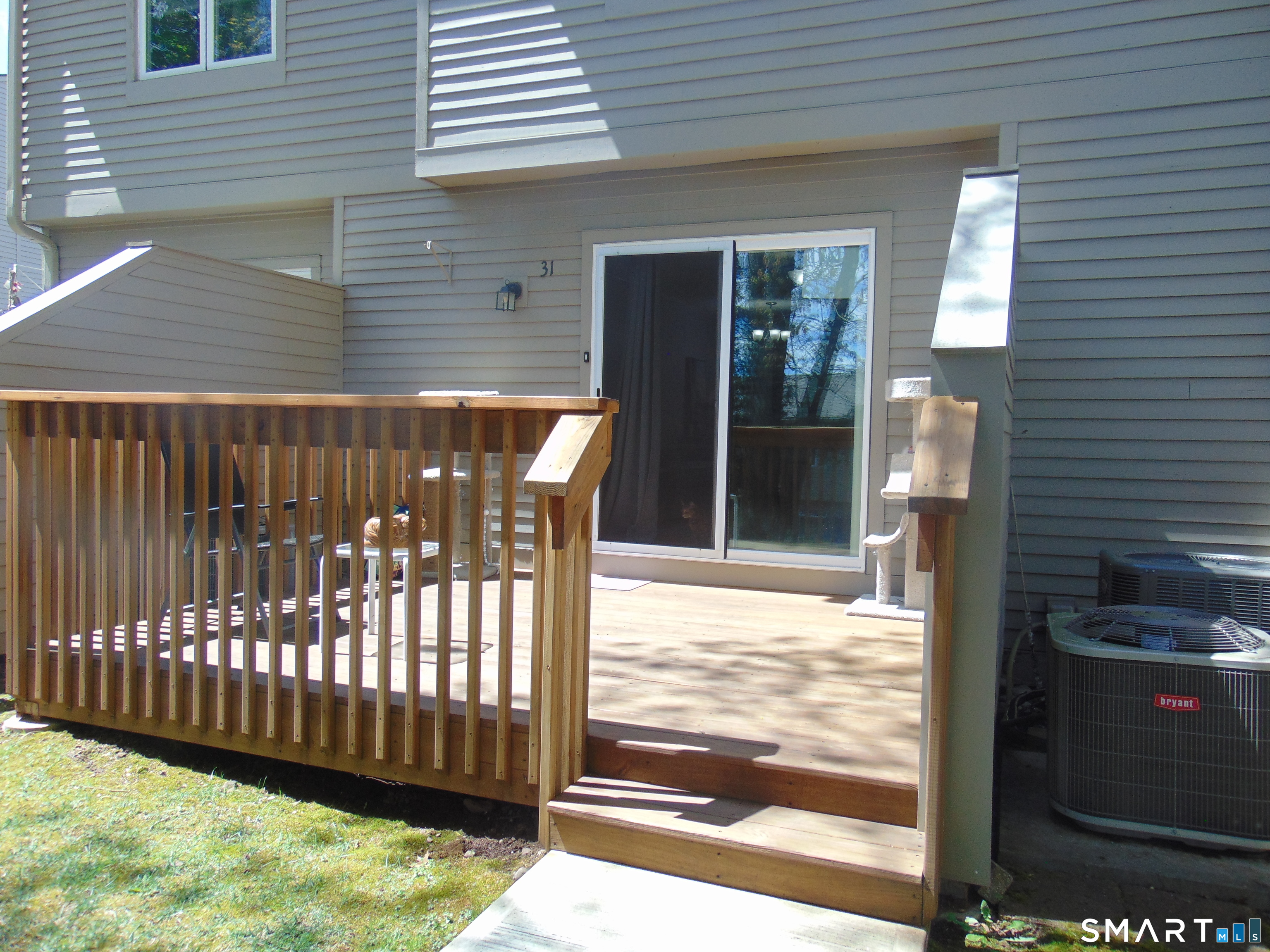 882 North Colony Road, Unit 31 Meriden, CT 06450 - Photo 7 of 34 a view of a balcony with a swing