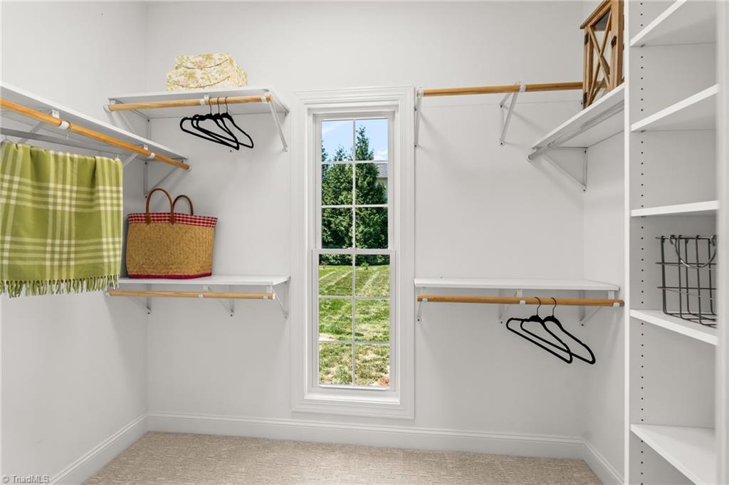 8419 Pheasant Ridge Drive Colfax, NC 27235 - Photo 25 of 49 Talk about a closet! This closet is part of the guest room