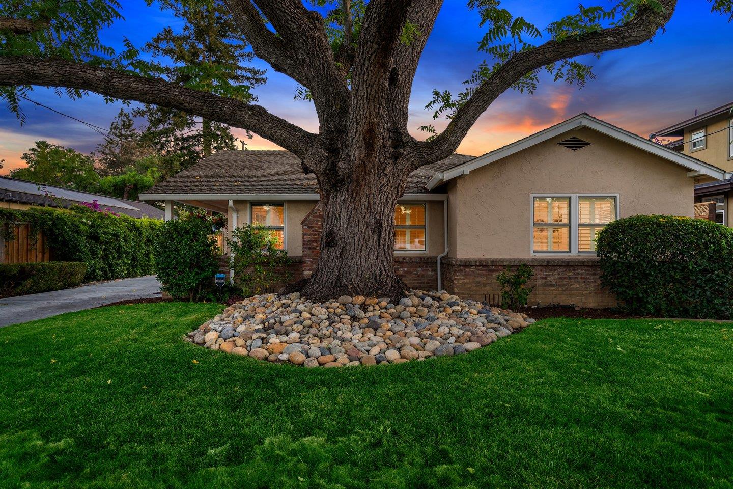 a backyard of a house with lots of green space