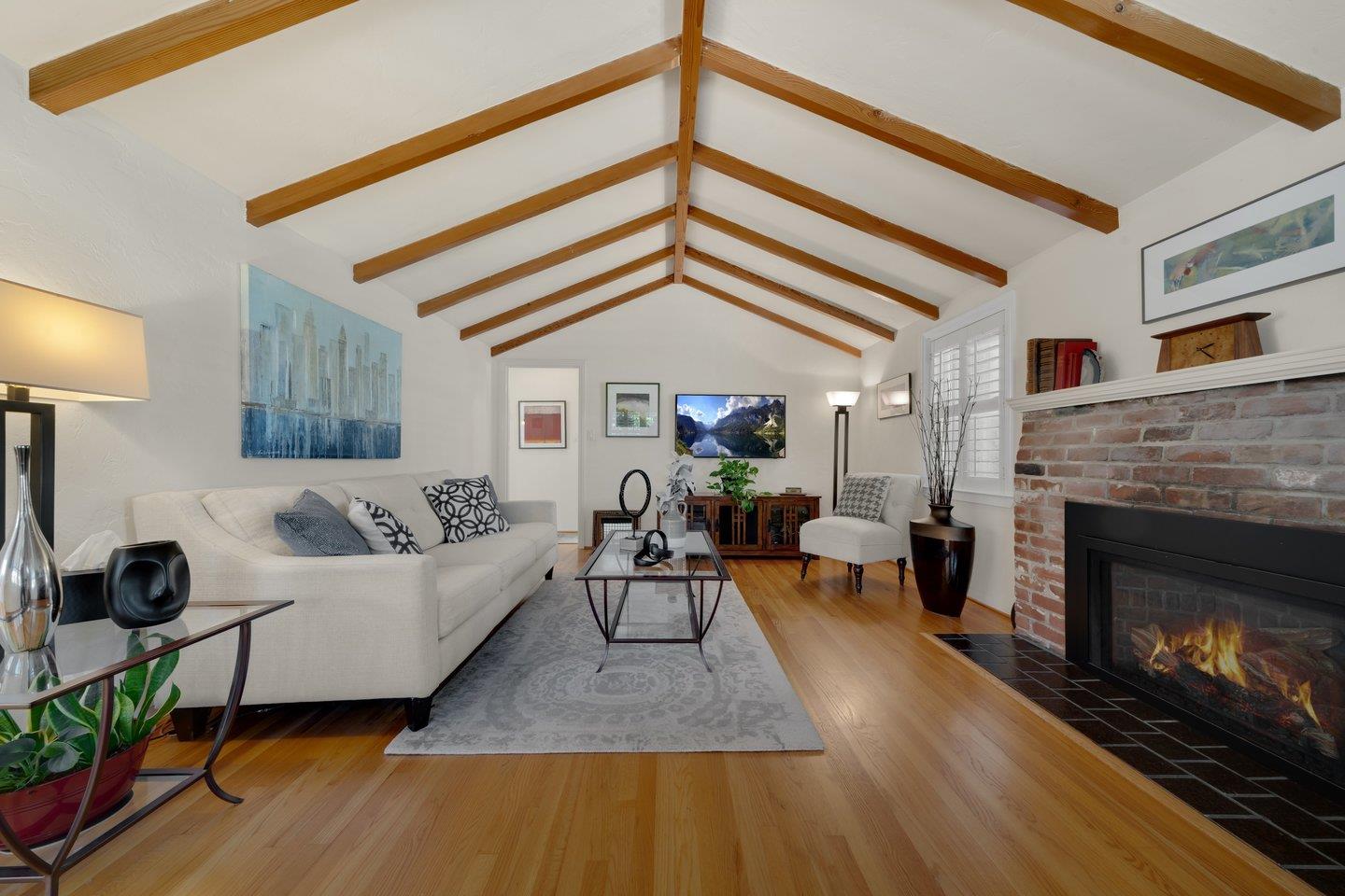 78 Cherry Lane Campbell, CA 95008 - Photo 11 of 49 a living room with furniture and a fireplace