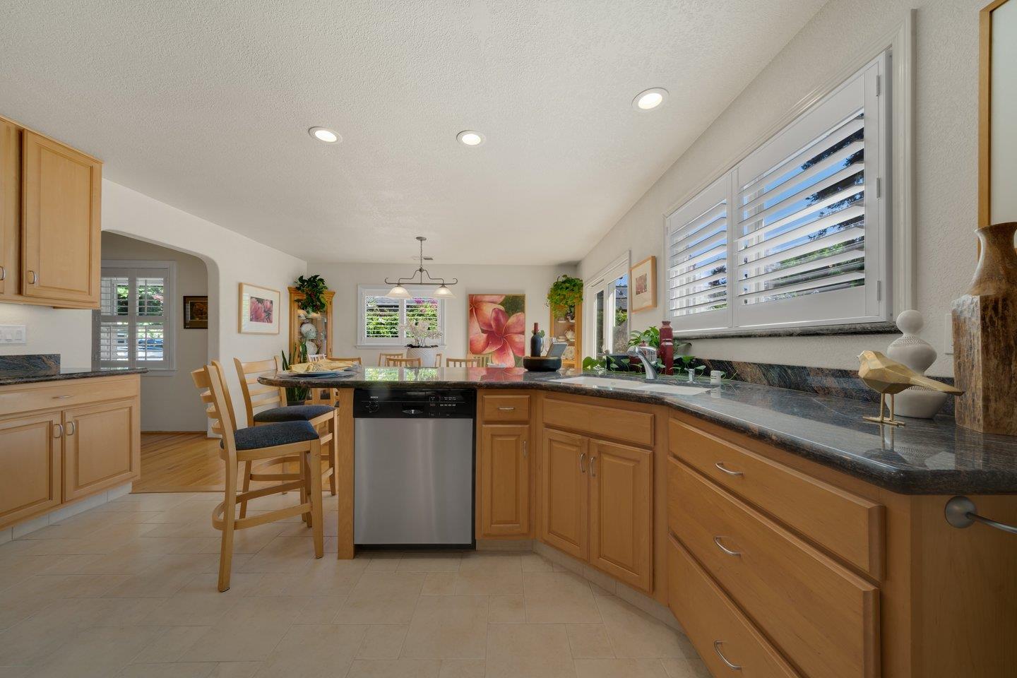 78 Cherry Lane Campbell, CA 95008 - Photo 18 of 49 a kitchen with lots of counter space and dining table