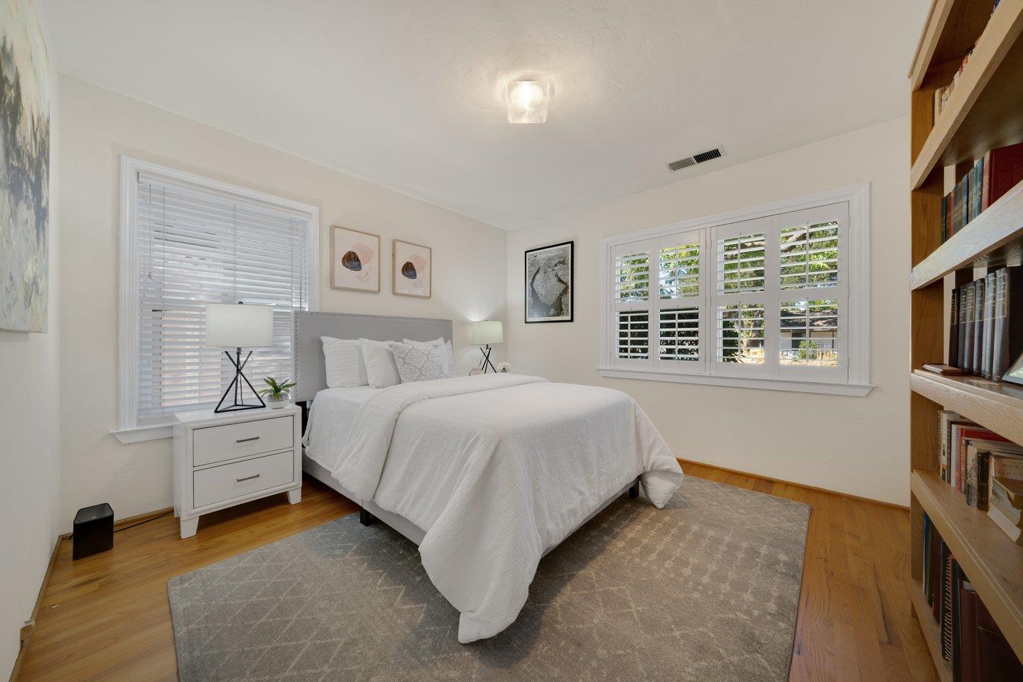 78 Cherry Lane Campbell, CA 95008 - Photo 27 of 49 a spacious bedroom with a bed and a window