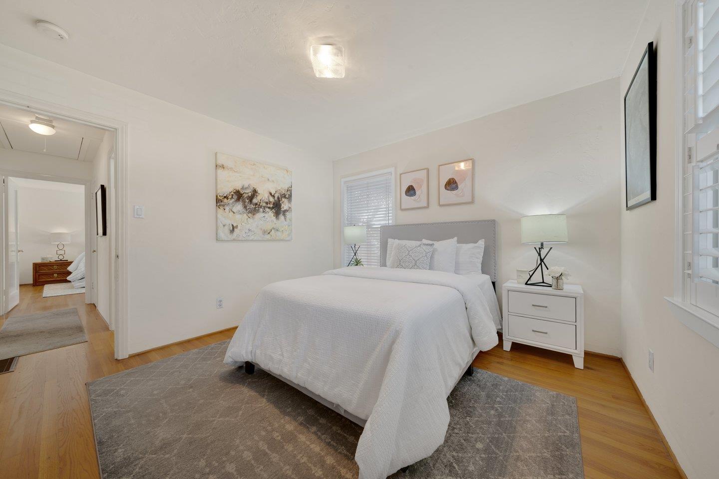 78 Cherry Lane Campbell, CA 95008 - Photo 28 of 49 a bedroom with a bed and a refrigerator