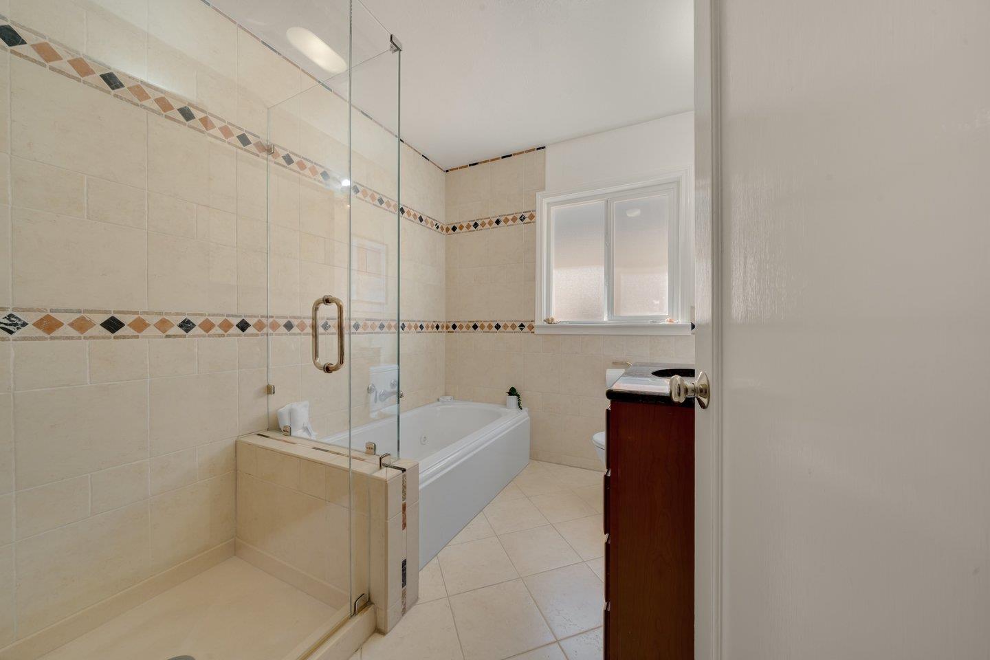 78 Cherry Lane Campbell, CA 95008 - Photo 32 of 49 a bathroom with a bathtub and shower