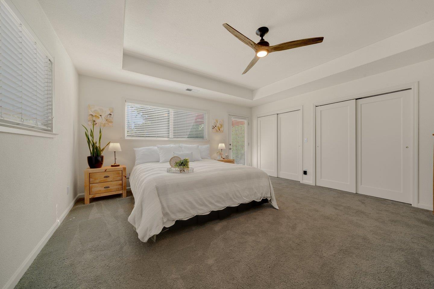 78 Cherry Lane Campbell, CA 95008 - Photo 36 of 49 a bed room with a bed and a ceiling fan