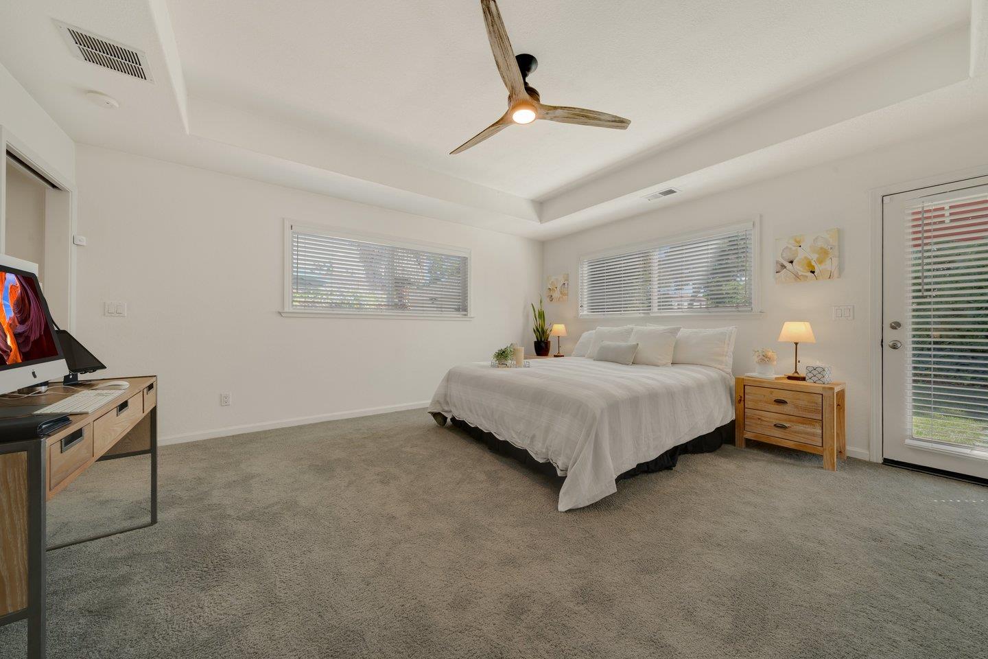 78 Cherry Lane Campbell, CA 95008 - Photo 37 of 49 a bedroom with a bed and a chandelier