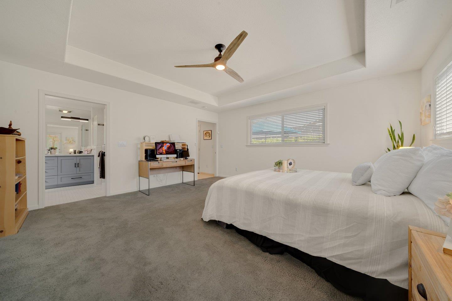 78 Cherry Lane Campbell, CA 95008 - Photo 39 of 49 a bedroom with a bed and a chandelier