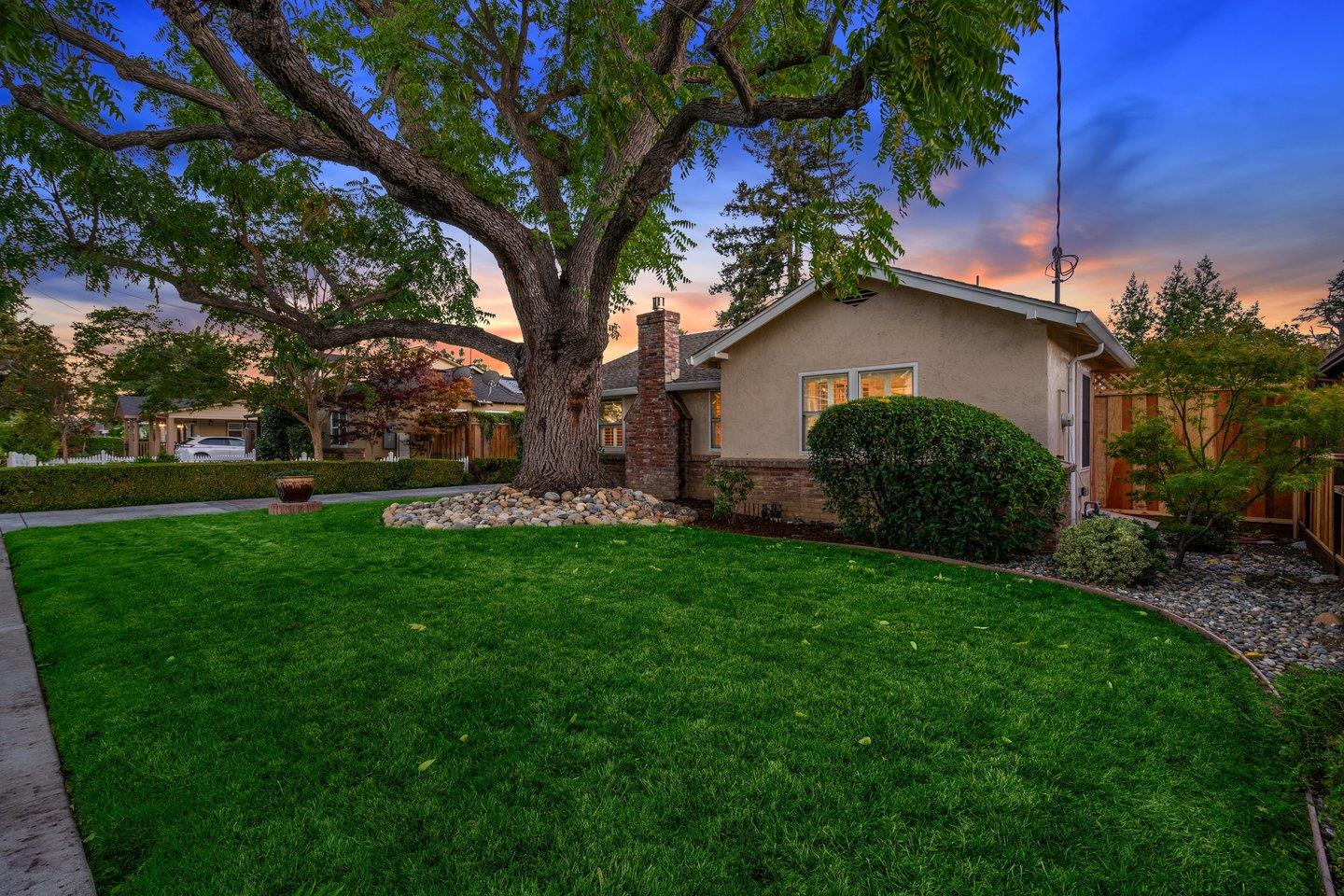 78 Cherry Lane Campbell, CA 95008 - Photo 4 of 49 a house that is sitting in the grass