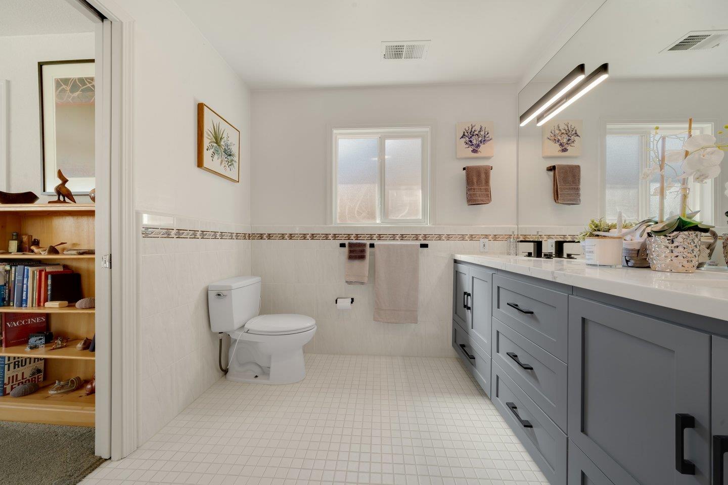 78 Cherry Lane Campbell, CA 95008 - Photo 41 of 49 a bathroom with a toilet a sink and a mirror