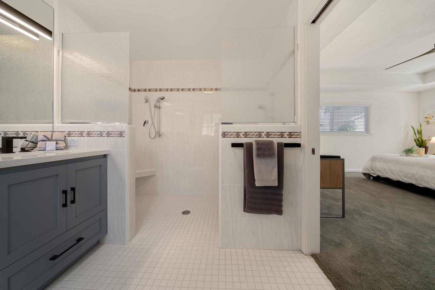 78 Cherry Lane Campbell, CA 95008 - Photo 42 of 49 a en suite bathroom with a double vanity sink and mirror