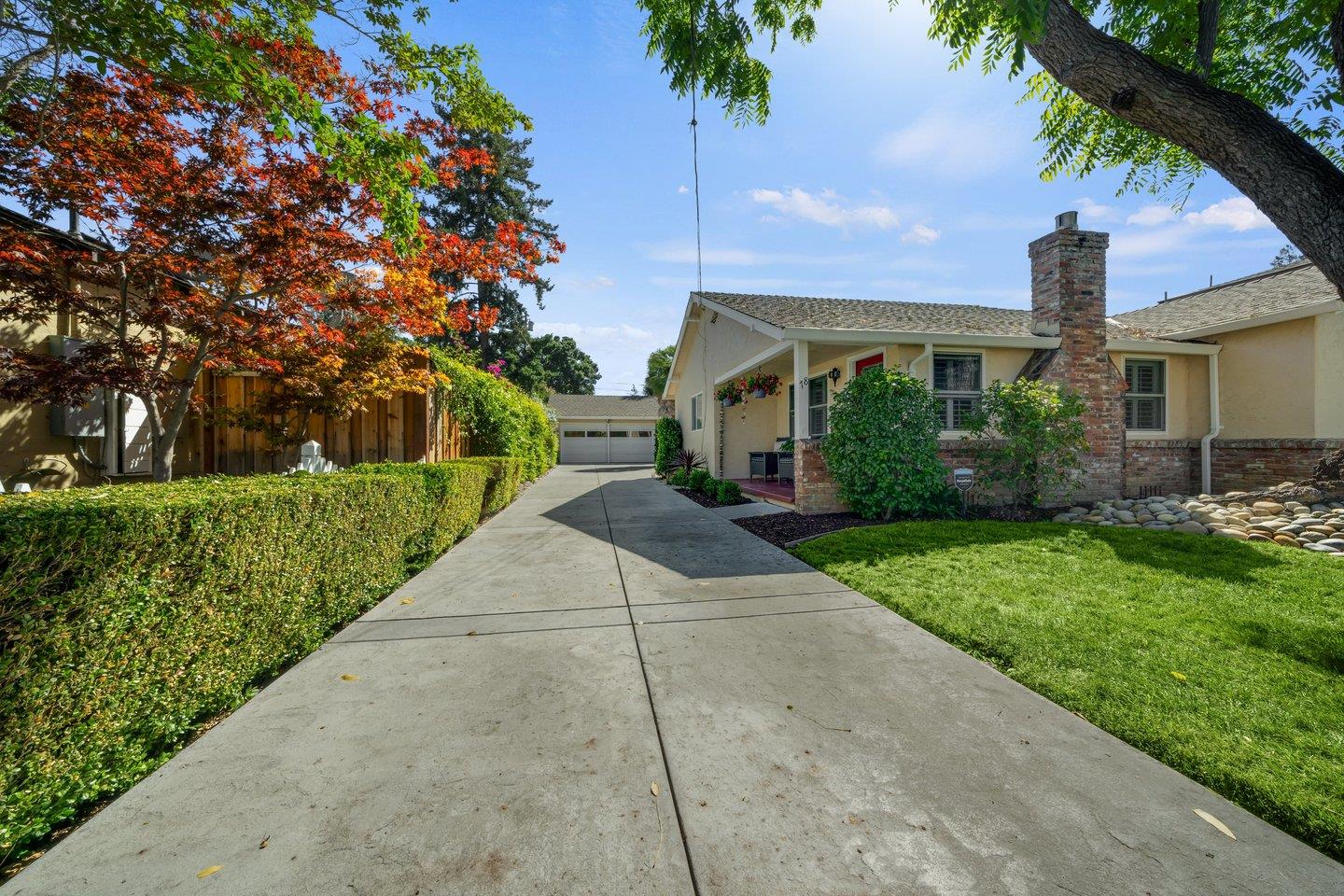 78 Cherry Lane Campbell, CA 95008 - Photo 8 of 49 a front view of a house with a yard and potted plants