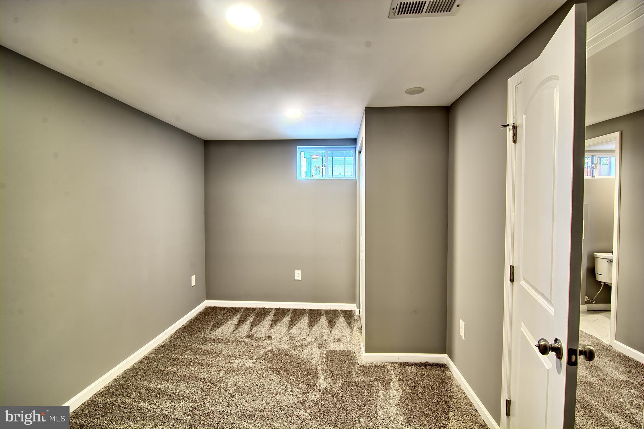 719 Stamford Road Baltimore, MD 21229 - Photo 24 of 29 Basement / Bedroom
