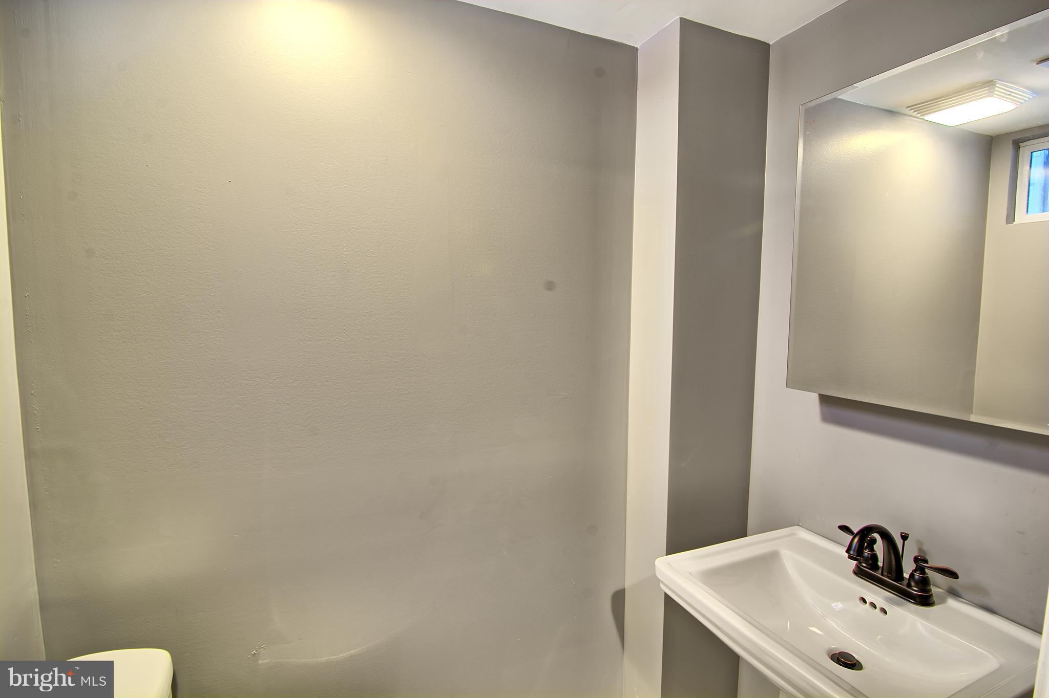 719 Stamford Road Baltimore, MD 21229 - Photo 25 of 29 Lower level bathroom