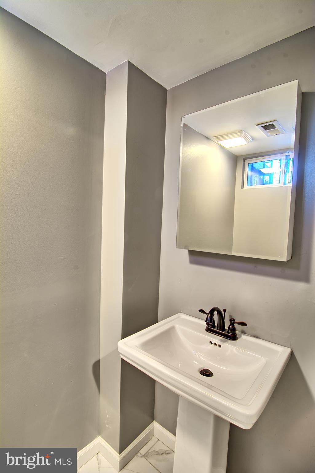 719 Stamford Road Baltimore, MD 21229 - Photo 26 of 29 Basement bathroom