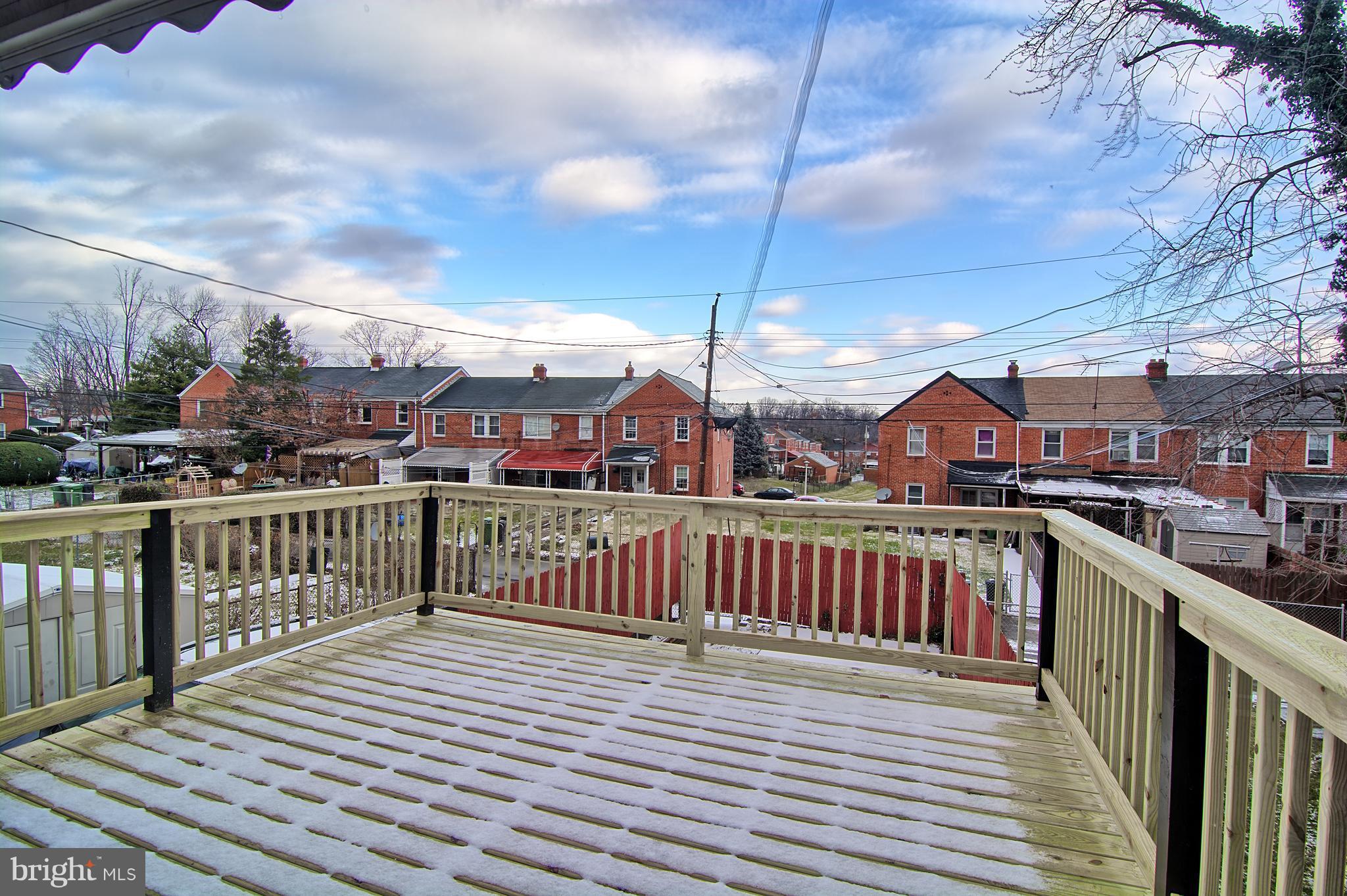 719 Stamford Road Baltimore, MD 21229 - Photo 27 of 29 Large new deck, excellent for entertainment