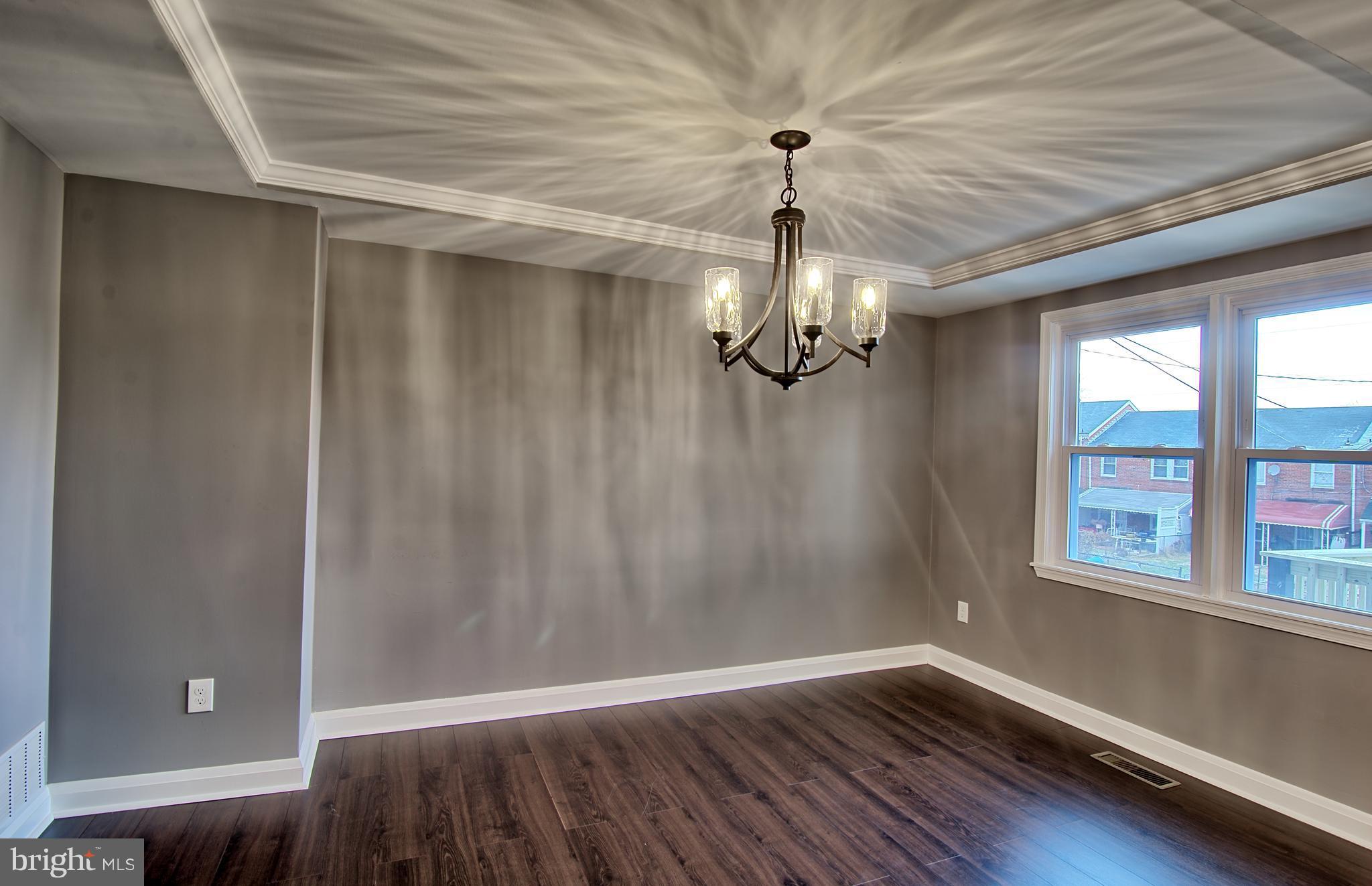 719 Stamford Road Baltimore, MD 21229 - Photo 7 of 29 Dining Room w/ custom lighting