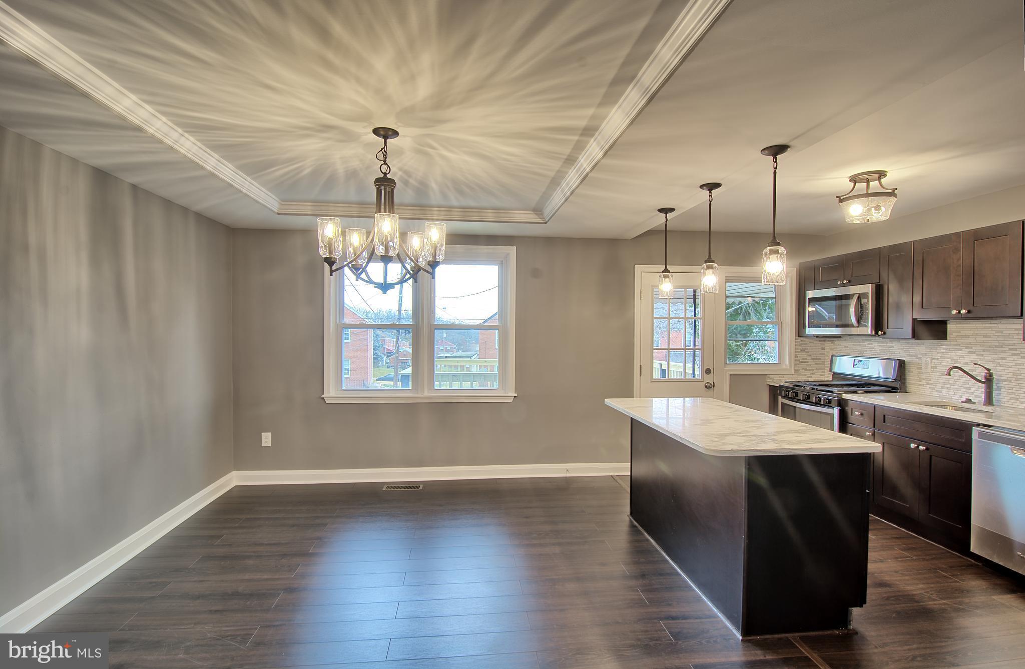 719 Stamford Road Baltimore, MD 21229 - Photo 9 of 29 Large Dining Room and Kitchen combo