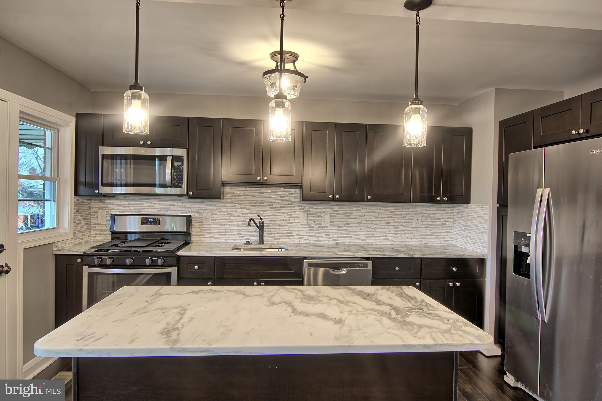 719 Stamford Road Baltimore, MD 21229 - Photo 10 of 29 Custom Kitchen, stand alone island, granite etc..