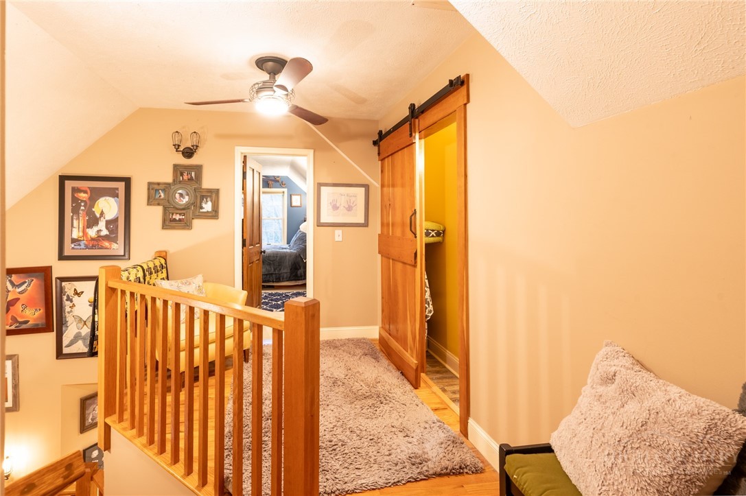 126 Moore Mountain Road Vilas, NC 28692 - Photo 20 of 41 a view of a hallway to a livingroom and a furniture