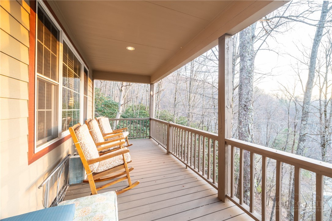 126 Moore Mountain Road Vilas, NC 28692 - Photo 30 of 41 a view of chairs with wooden floor and outdoor space
