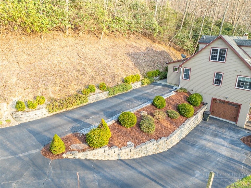 126 Moore Mountain Road Vilas, NC 28692 - Photo 39 of 41 a view of swimming pool with a yard