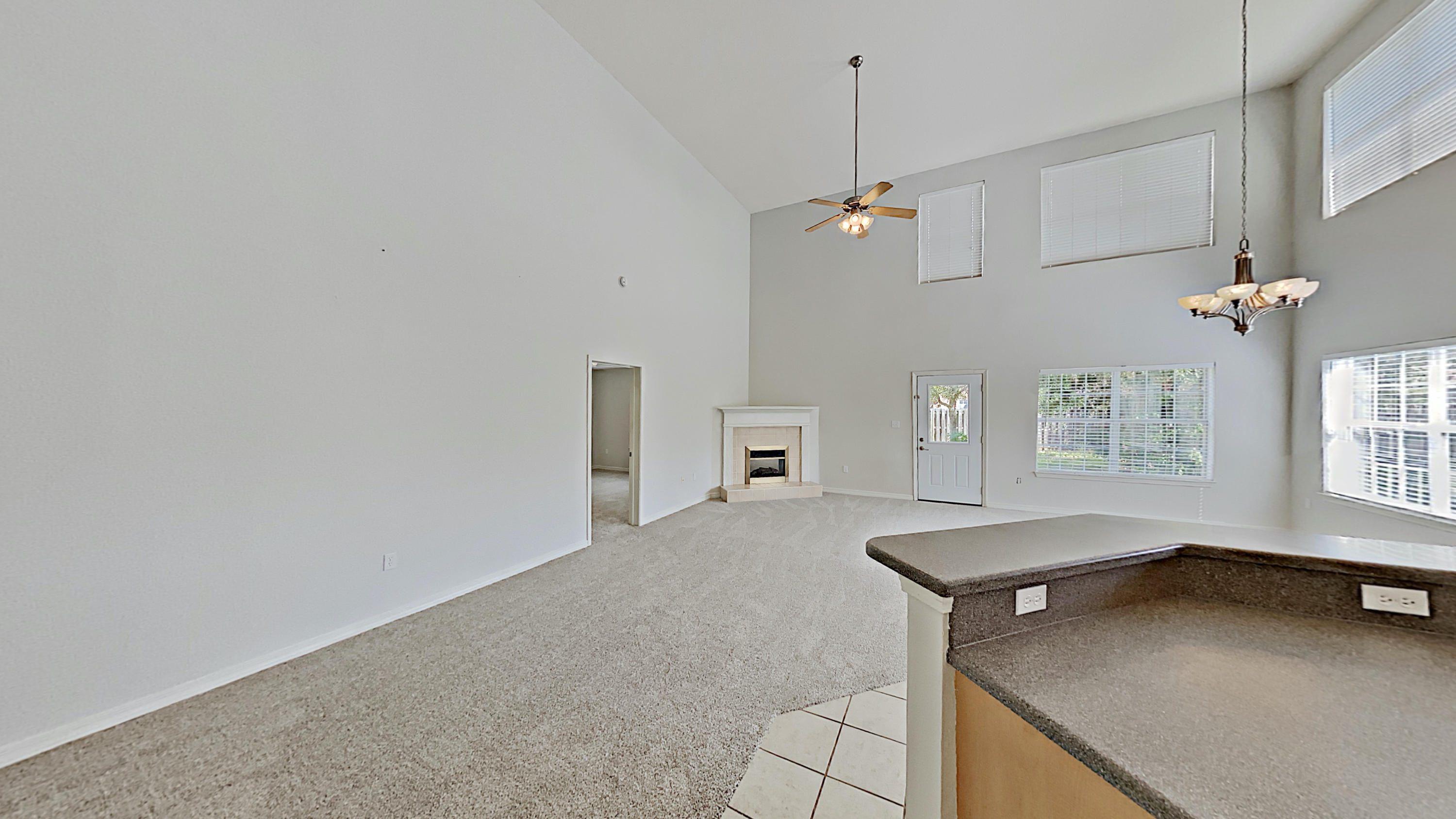 113 Red Maple Court Santa Rosa Beach, FL 32459 - Photo 12 of 36 a view of a kitchen with a sink and chandelier