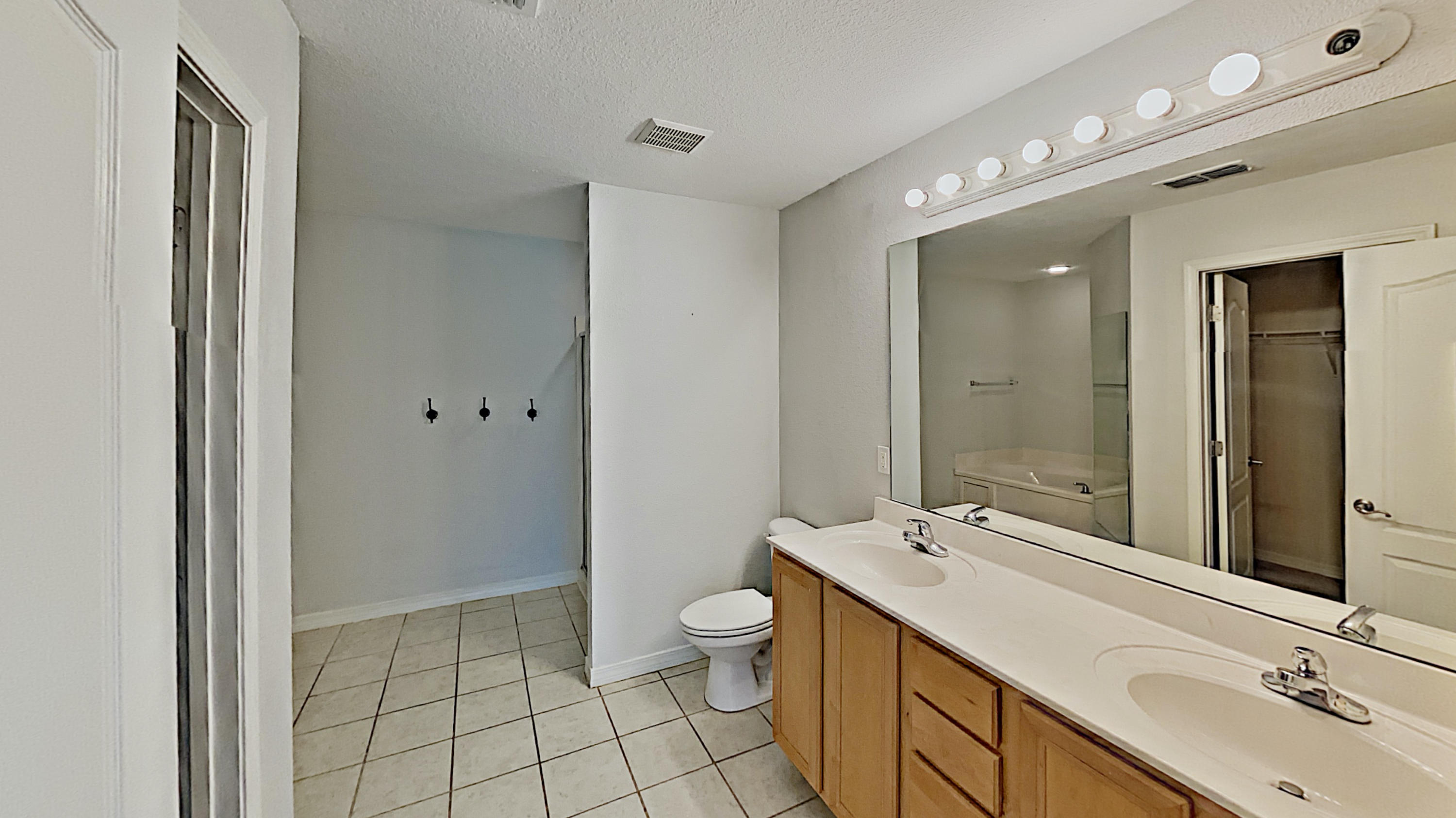 113 Red Maple Court Santa Rosa Beach, FL 32459 - Photo 18 of 36 a bathroom with a sink a toilet and shower