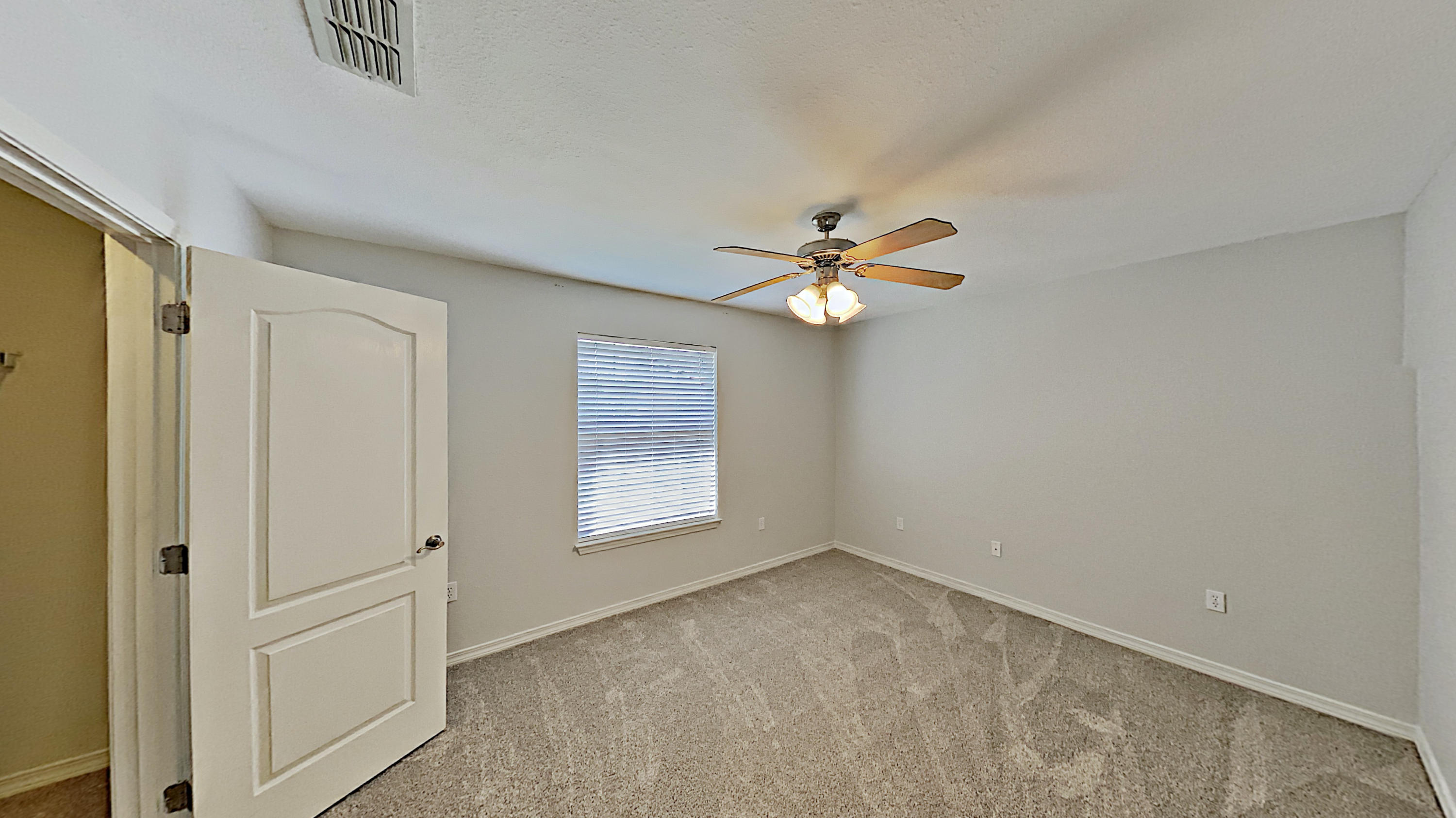 113 Red Maple Court Santa Rosa Beach, FL 32459 - Photo 29 of 36 an empty room with windows and fan