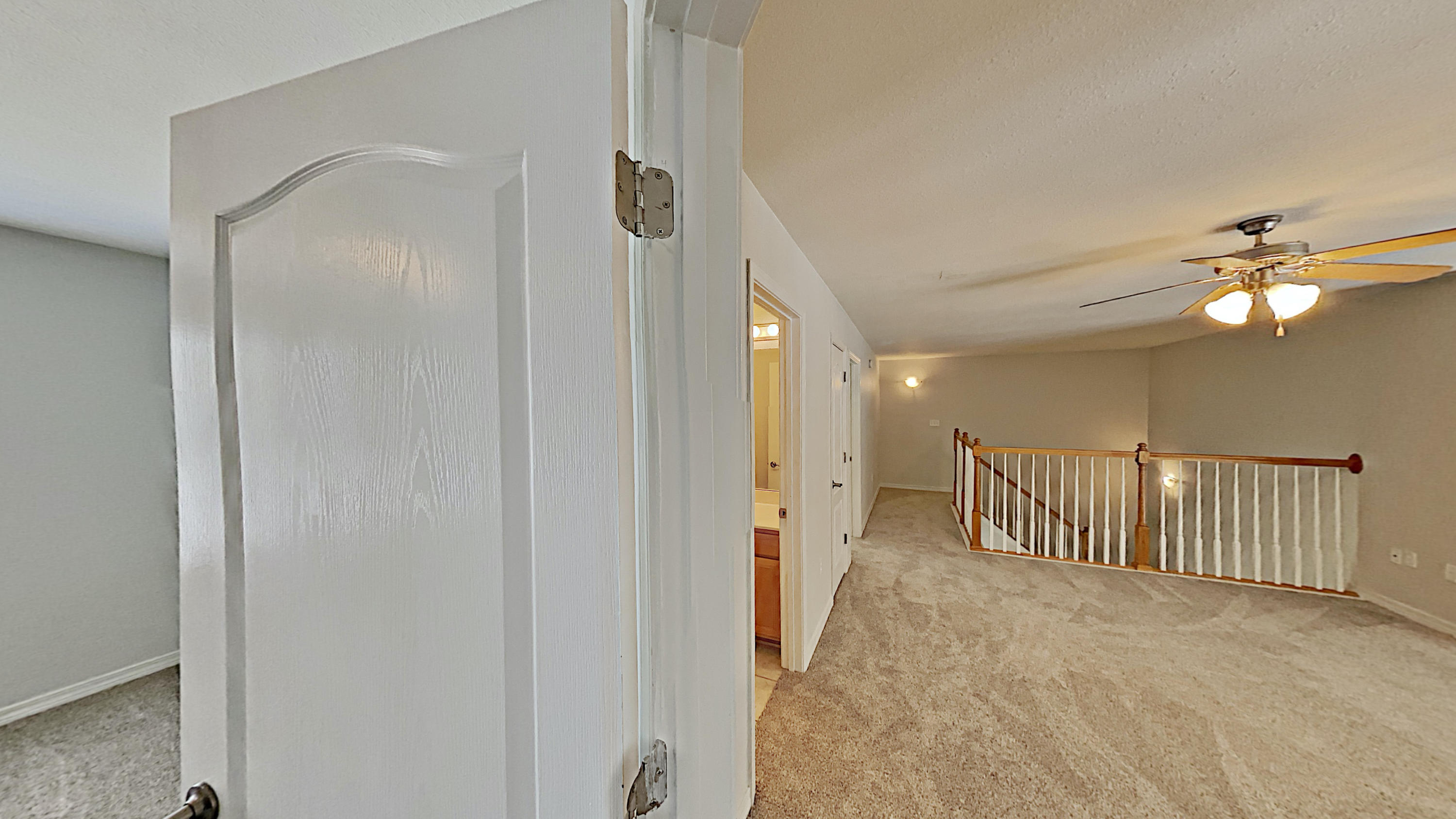 113 Red Maple Court Santa Rosa Beach, FL 32459 - Photo 32 of 36 a view of a hallway with chandelier