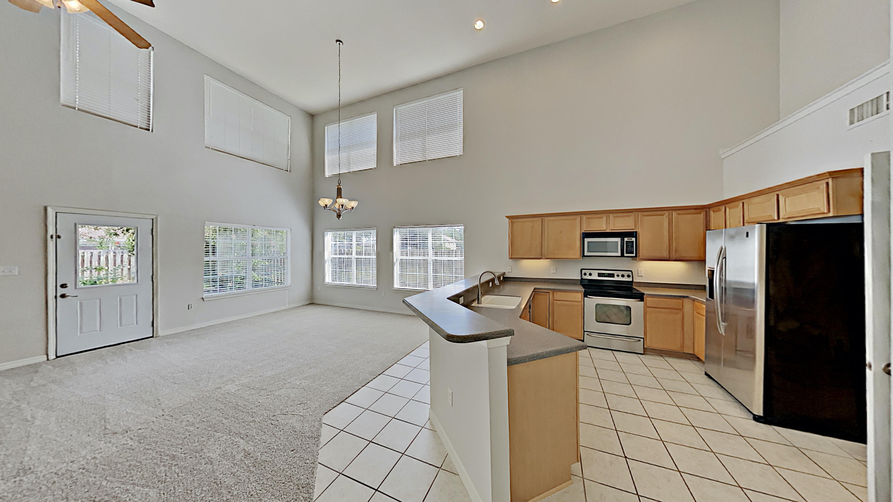 113 Red Maple Court Santa Rosa Beach, FL 32459 - Photo 6 of 36 a kitchen with cabinets and wooden floor