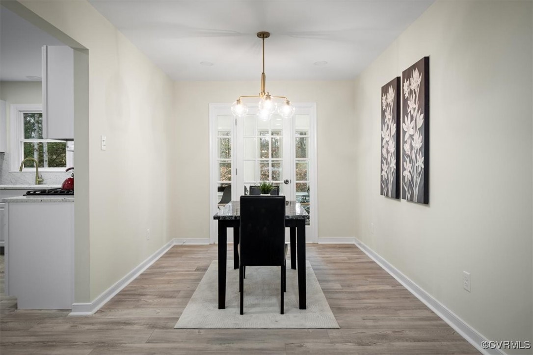6920 Belmont Road Chesterfield, VA 23832 - Photo 14 of 50 Dining room with sink, light hardwood / wood-style