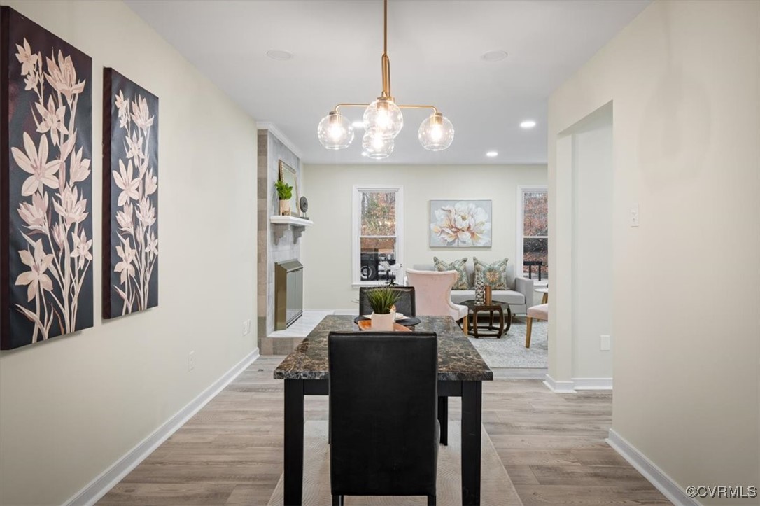 6920 Belmont Road Chesterfield, VA 23832 - Photo 15 of 50 Dining area with a large fireplace, an inviting ch