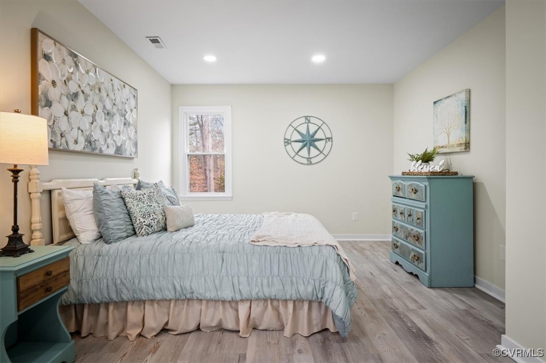 6920 Belmont Road Chesterfield, VA 23832 - Photo 35 of 50 Bedroom with light hardwood / wood-style flooring